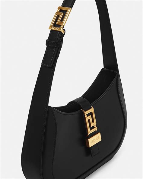 models carrying the versace greca goddess small small shoulder bag|Greca Goddess Small Shoulder Bag .